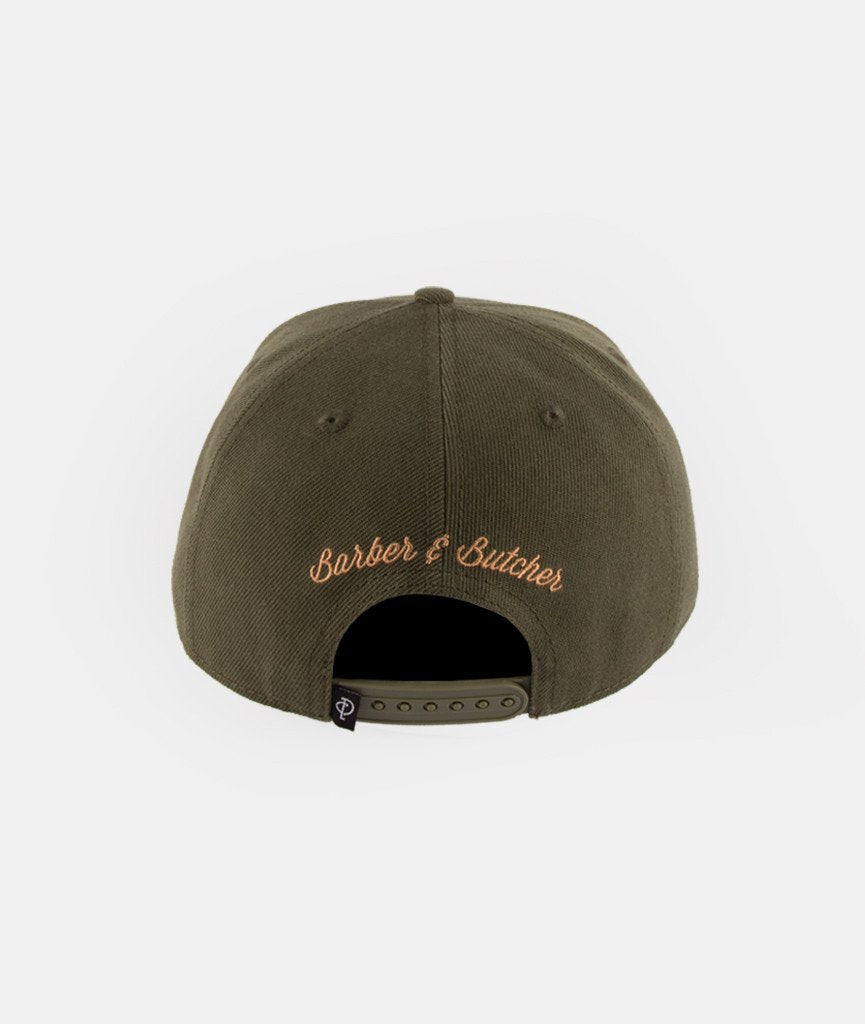 Barber & Butcher snapback cap by Distorted People