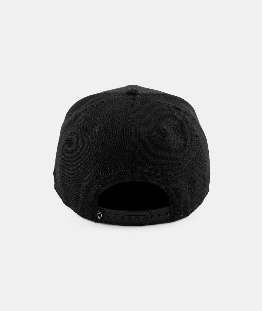 Barber & Butcher snapback cap by Distorted People