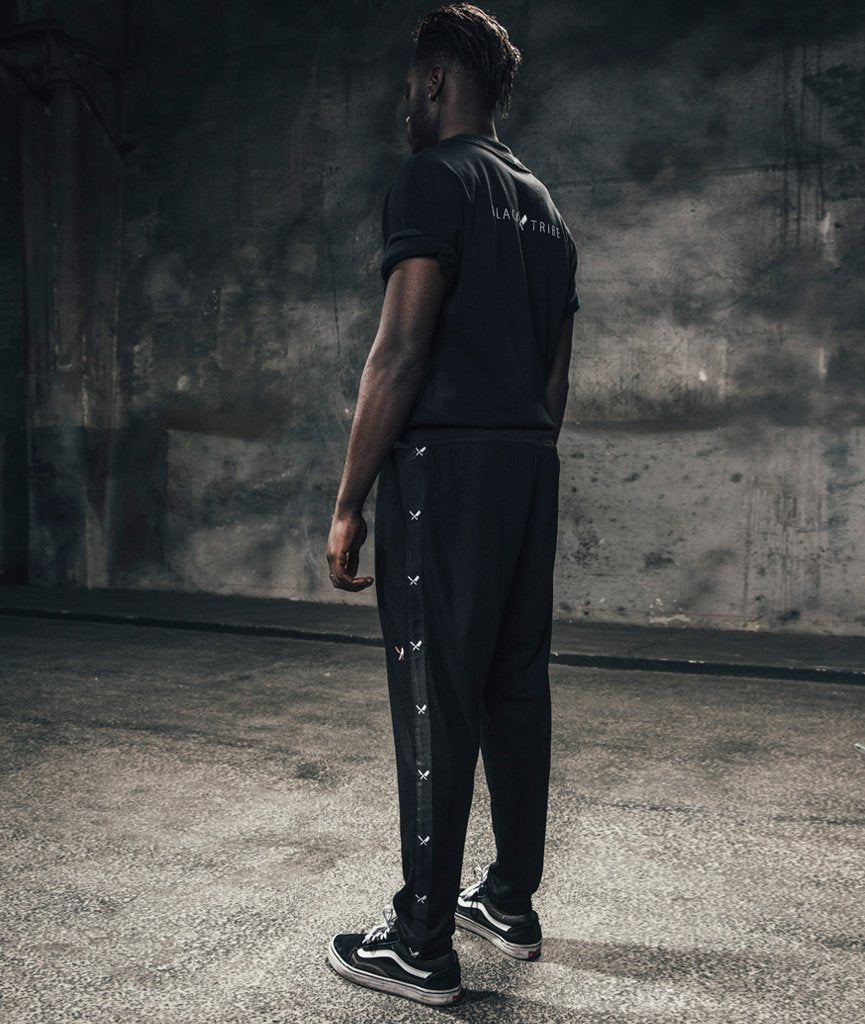 Exile Trackpants pants by Distorted People