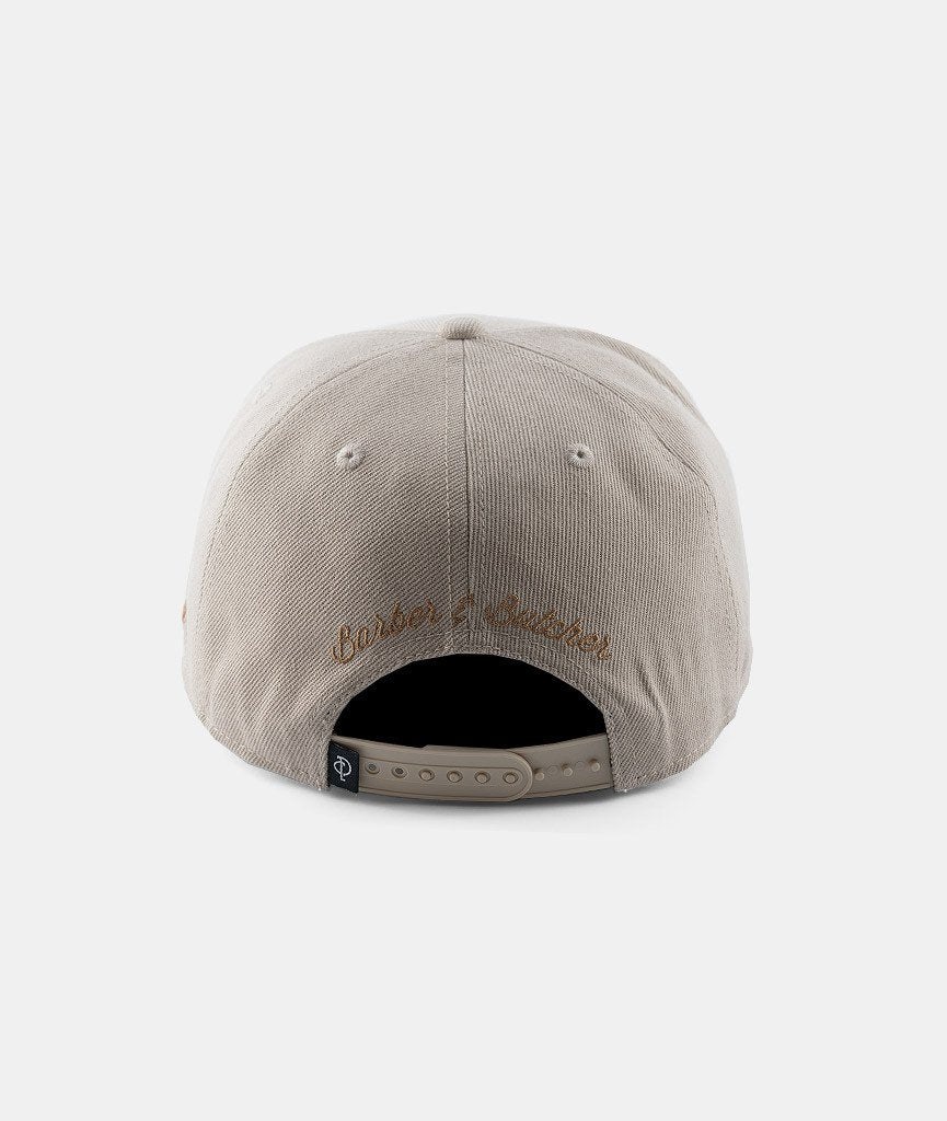 Barber & Butcher snapback cap by Distorted People