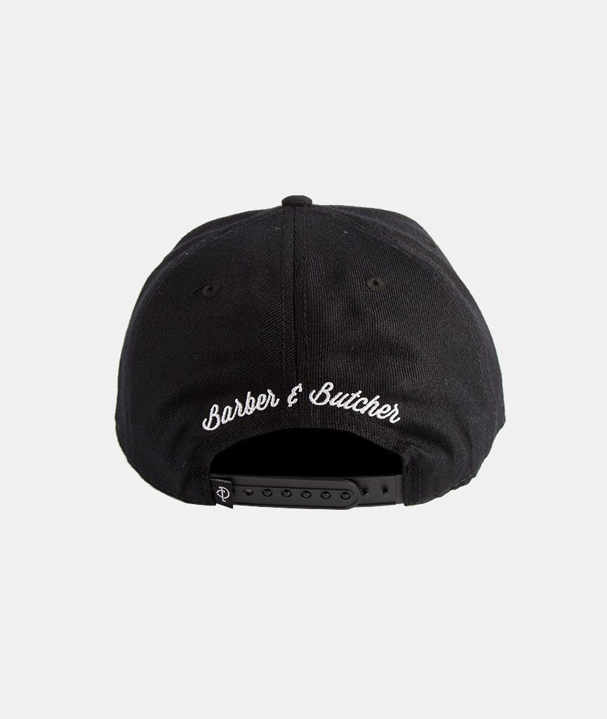 Barber & Butcher snapback cap by Distorted People