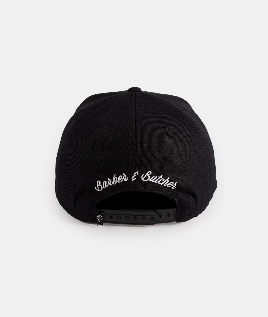 Barber & Butcher snapback cap by Distorted People