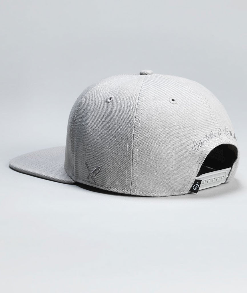 BARBER & BUTCHER snapback cap by Distorted People